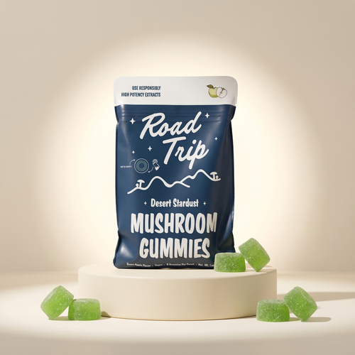 Green Apple mushroom gummies on podium